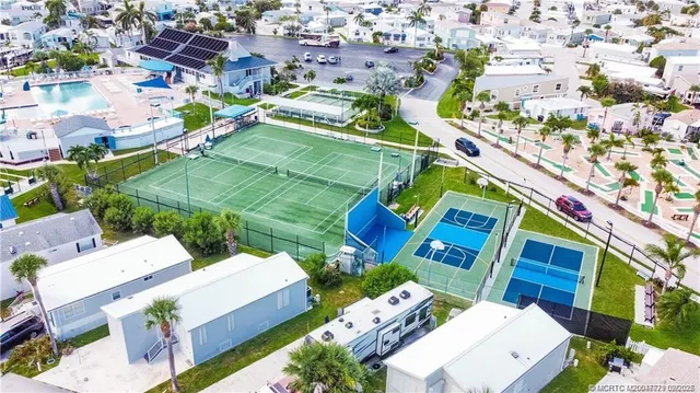 a view of swimming pool with outdoor seating