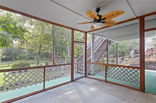 a view of a room with iron stairs