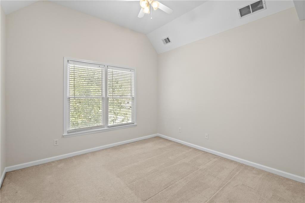 3685 Rolling Creek Drive Northeast Buford, GA 30519 - Photo 24 of 48 an empty room with a window