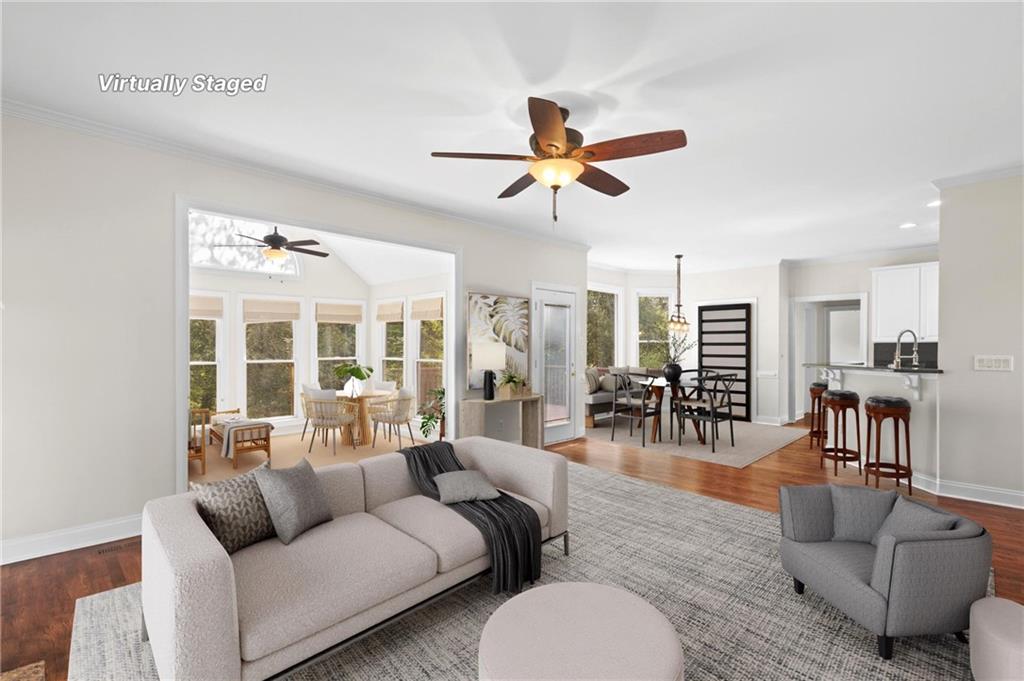 3685 Rolling Creek Drive Northeast Buford, GA 30519 - Photo 4 of 48 a living room with furniture and a large window