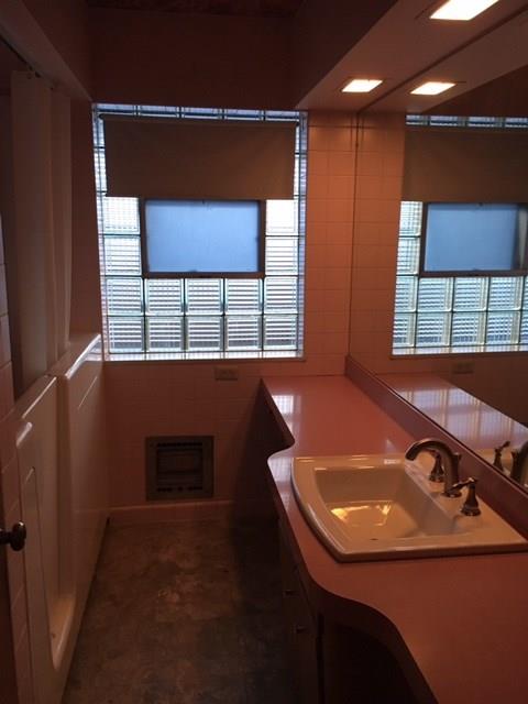 1125 State Road Monessen, PA 15062 - Photo 13 of 25 Full Bathroom on the Main Level with Walk-in Tub and Block Glass Windows.