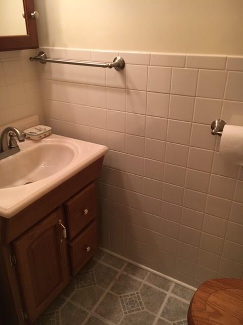 1125 State Road Monessen, PA 15062 - Photo 15 of 25 Main Level Powder Room in Hallway off Dining Room.