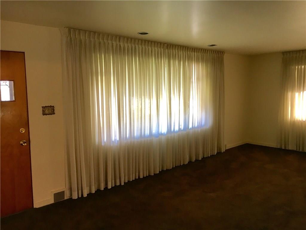 1125 State Road Monessen, PA 15062 - Photo 4 of 25 Huge Living Room with two windows.