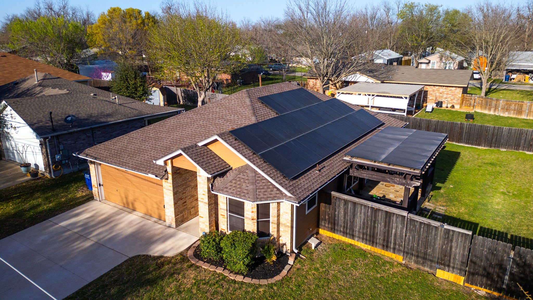 409 Lydia Lane Thrall, TX 76578 - Photo 2 of 25 a view of a house with backyard and trees