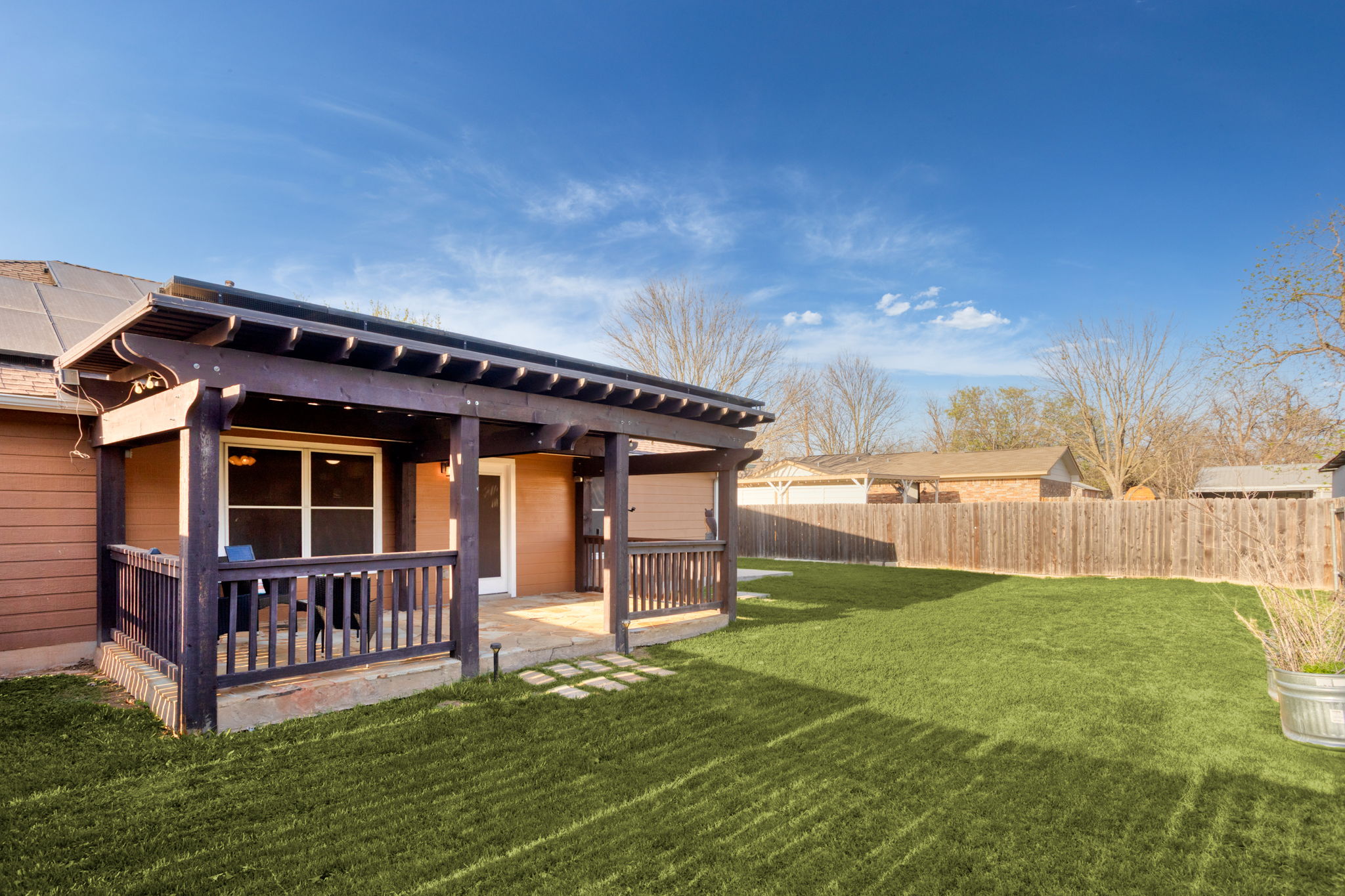 409 Lydia Lane Thrall, TX 76578 - Photo 21 of 25 a view of a house with a yard and deck