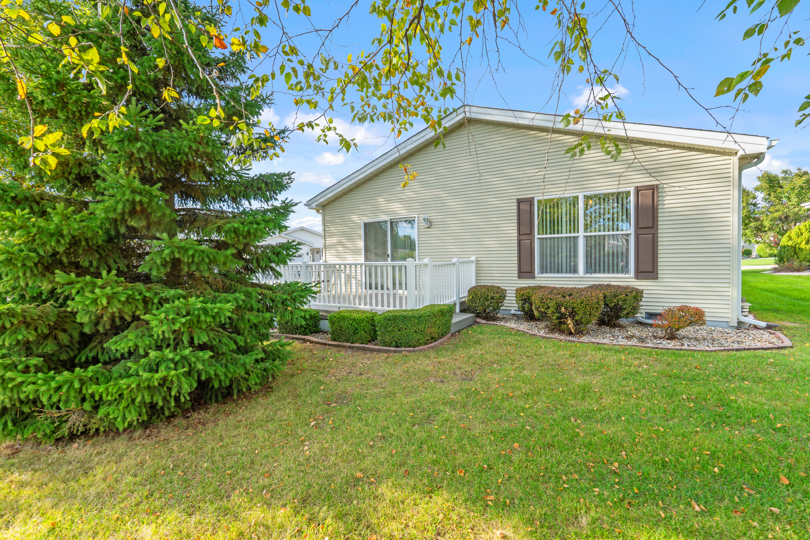 3310 Stakes Lane Grayslake, IL 60030 - Photo 2 of 4 a view of a house with a yard and potted plants