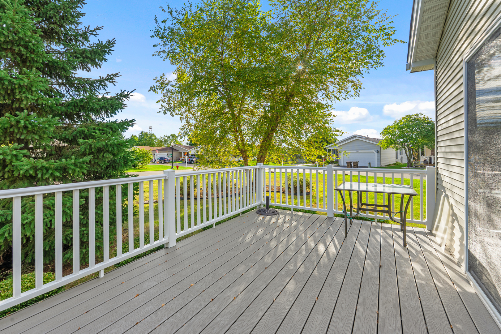 3310 Stakes Lane Grayslake, IL 60030 - Photo 4 of 4 a view of a wooden deck with a yard