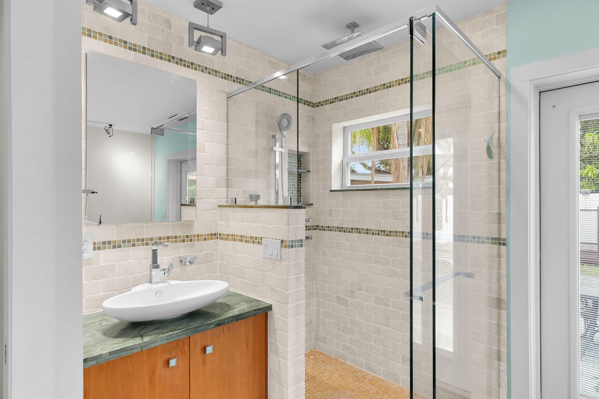 3707 Paula Avenue Key West, FL 33040 - Photo 15 of 26 a bathroom with a sink double vanity and shower