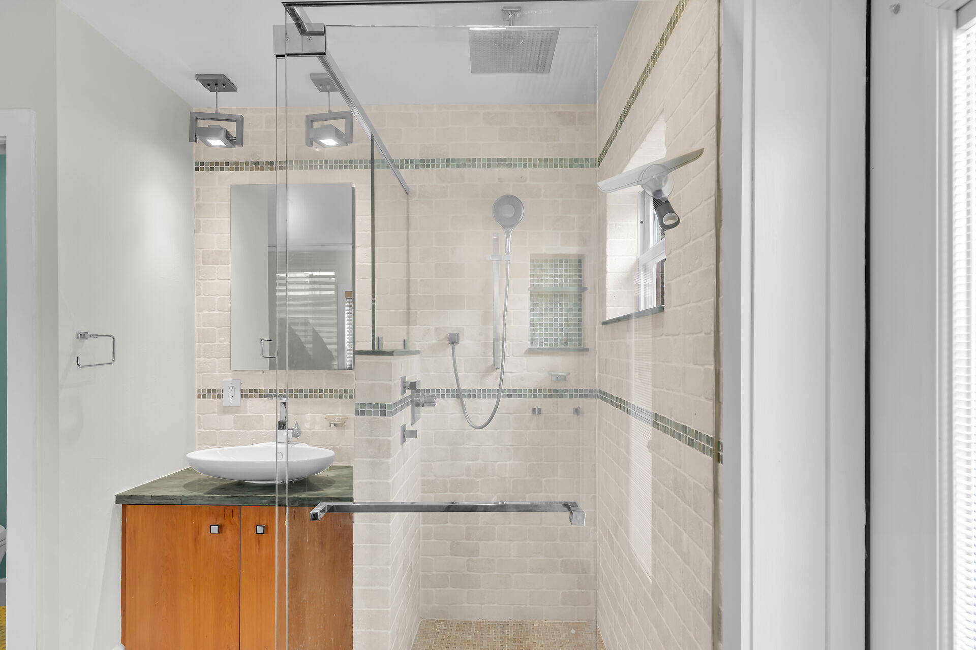 3707 Paula Avenue Key West, FL 33040 - Photo 16 of 26 a bathroom with a sink vanity and shower