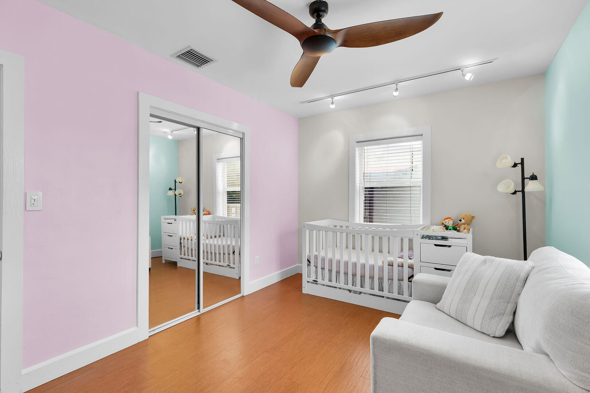 3707 Paula Avenue Key West, FL 33040 - Photo 18 of 26 a bedroom with furniture and a window