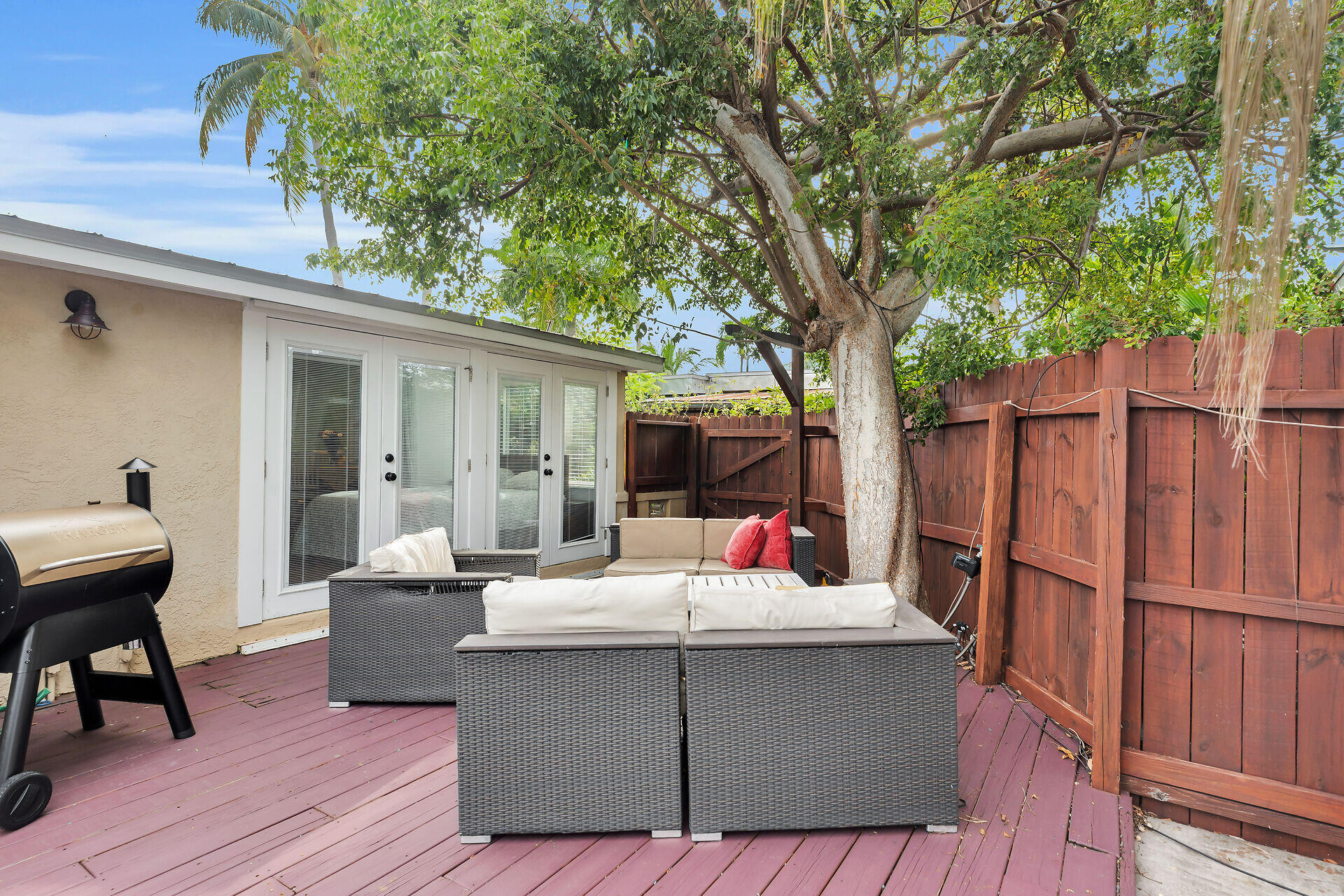 3707 Paula Avenue Key West, FL 33040 - Photo 21 of 26 a view of a deck with table and chairs and wooden floor