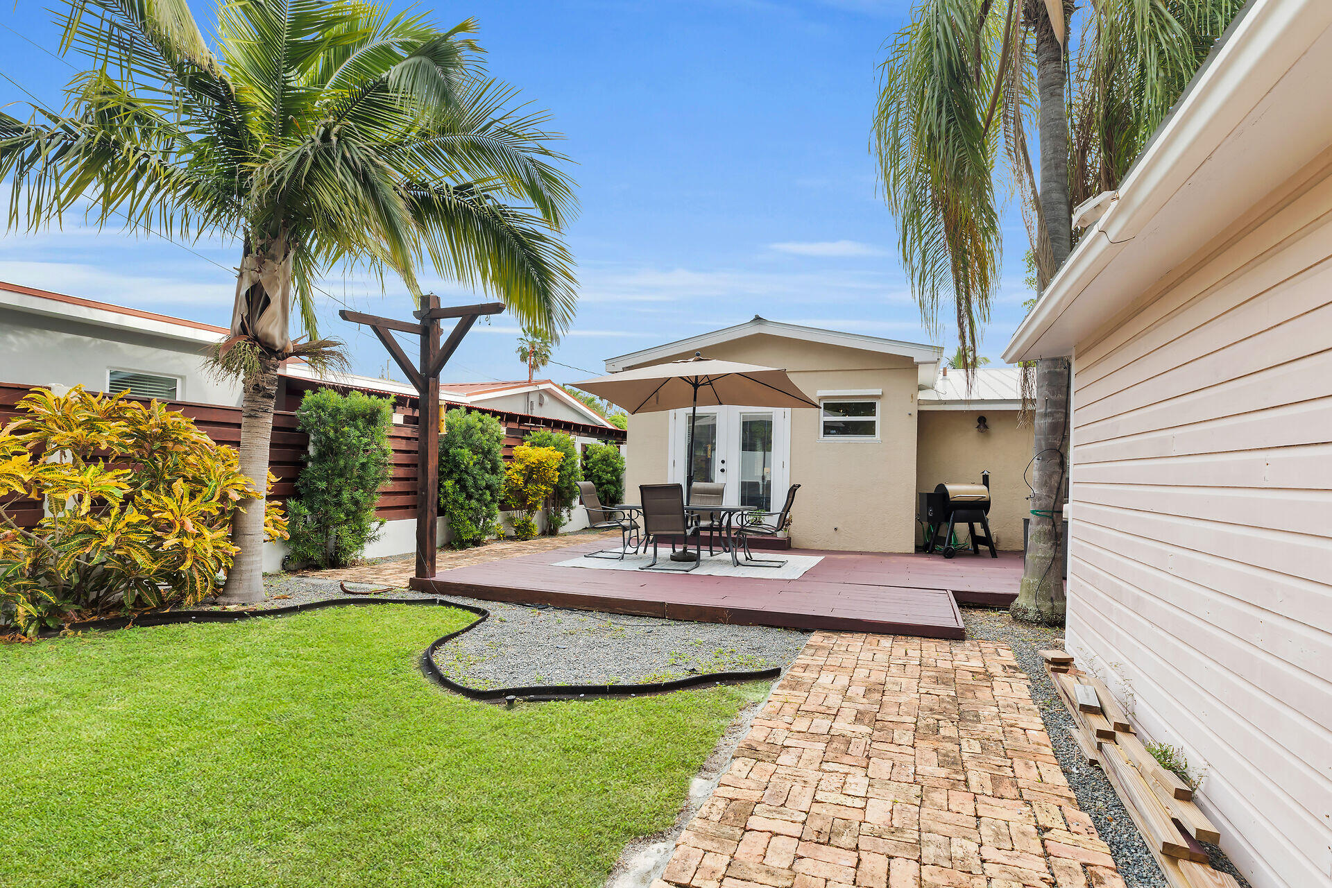 3707 Paula Avenue Key West, FL 33040 - Photo 25 of 26 a view of a house with backyard porch and sitting area