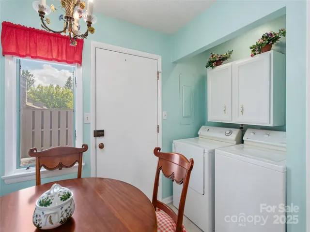 a room that has a bed and a chair in it