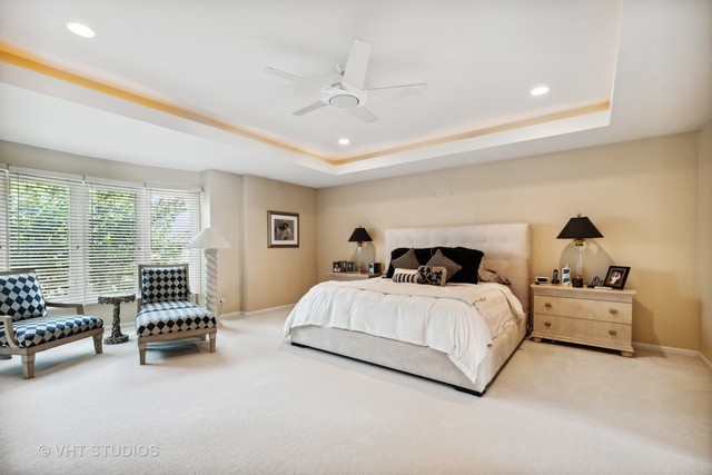 108 Riverside Drive Deerfield, IL 60015 - Photo 14 of 22 a spacious bedroom with a bed and a couch