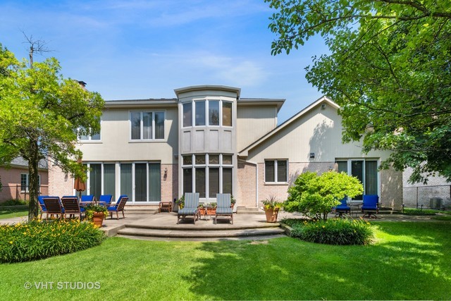 108 Riverside Drive Deerfield, IL 60015 - Photo 3 of 22 a front view of house with yard and outdoor seating