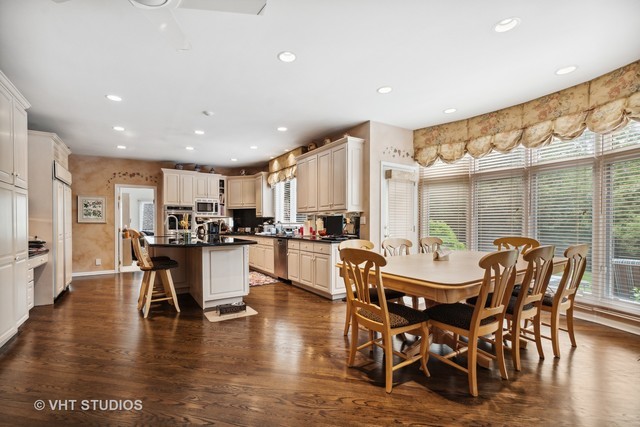 108 Riverside Drive Deerfield, IL 60015 - Photo 6 of 22 a view of a dining room with furniture window and wooden floor