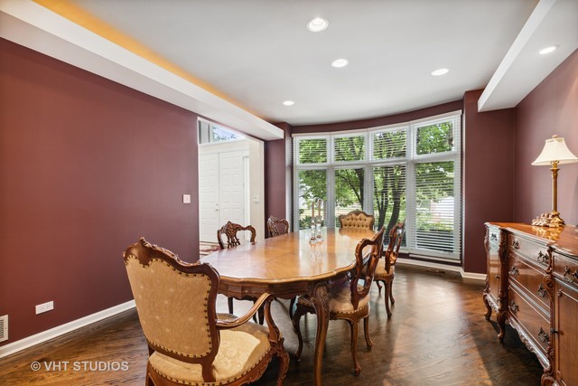 108 Riverside Drive Deerfield, IL 60015 - Photo 7 of 22 a dining room with furniture and wooden floor