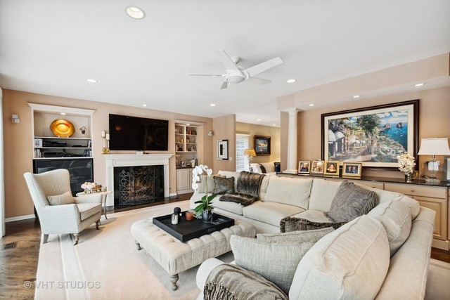 108 Riverside Drive Deerfield, IL 60015 - Photo 9 of 22 a living room with furniture fireplace and a large window