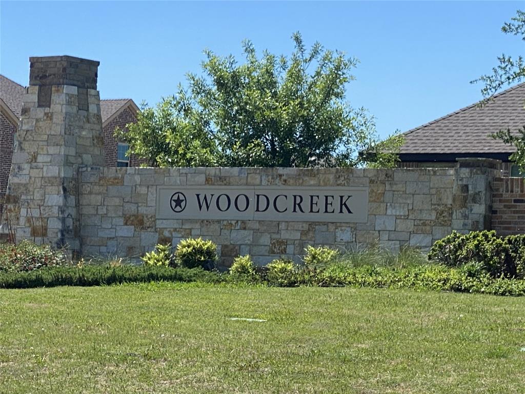 813 Mildren Lane Fate, TX 75087 - Photo 26 of 32 Beautiful stone entrance to the Woodcreek subdivision!