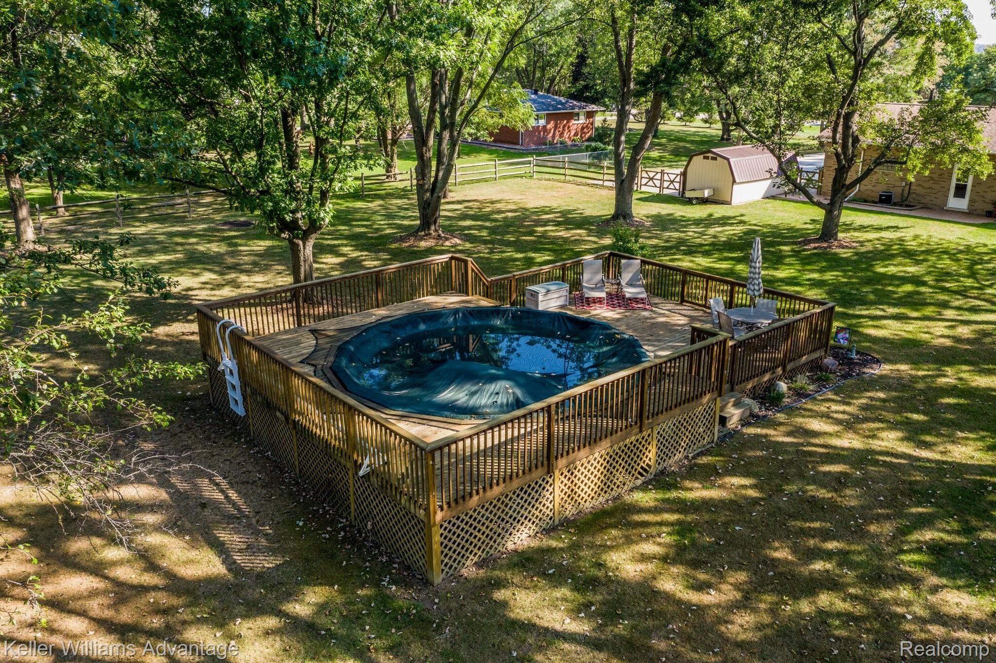 29260 Olmstead Road Flat Rock, MI 48134 - Photo 23 of 30 Above ground pool with custom built deck surround