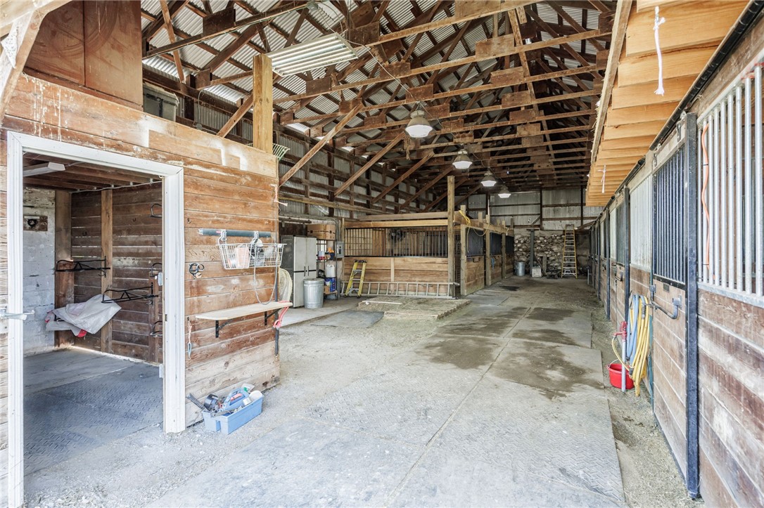 4599 Papermill Road Avon, NY 14414 - Photo 33 of 49 Tack room and stalls