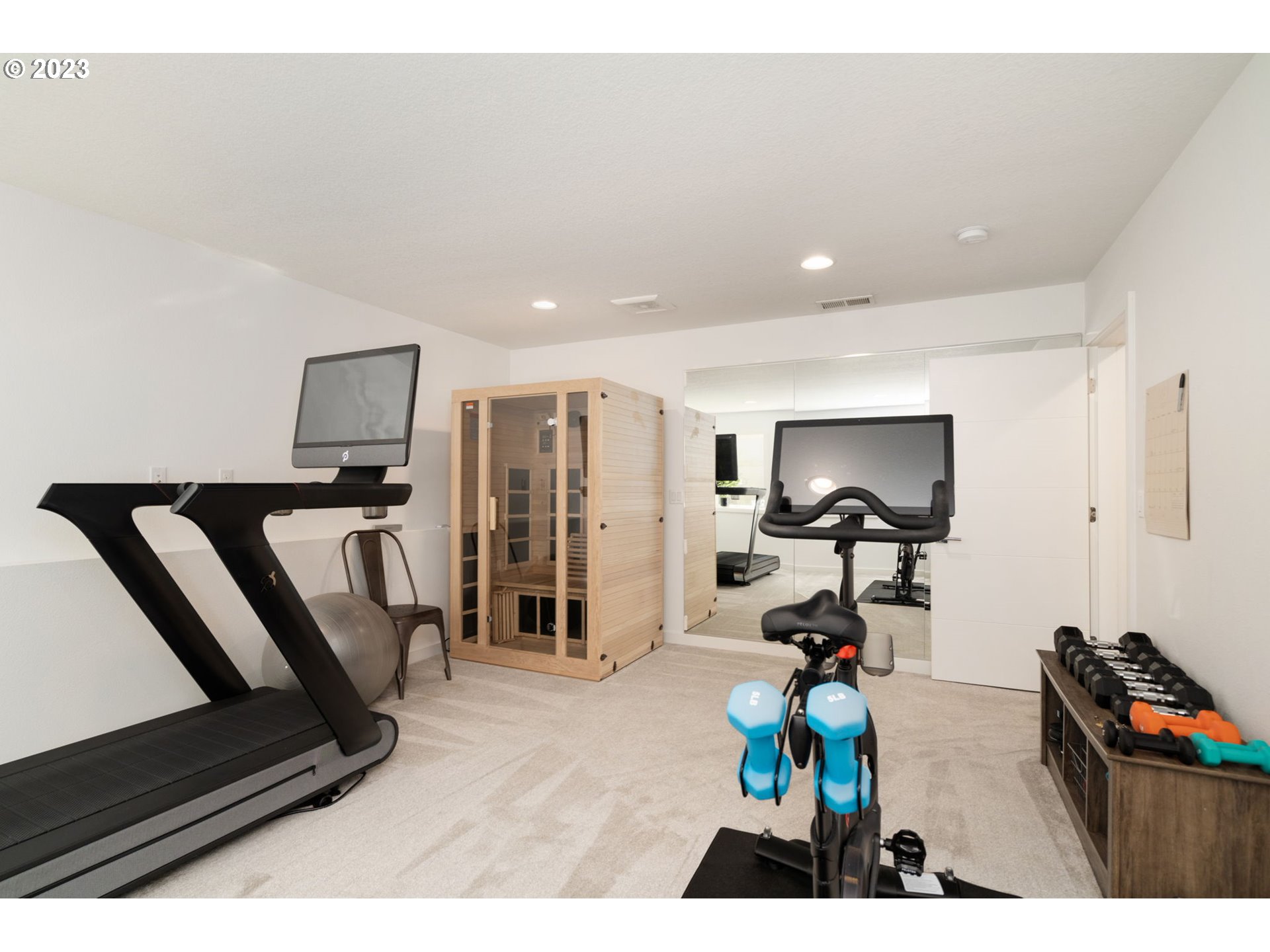 7660 Southwest 36th Avenue Portland, OR 97219 - Photo 20 of 40 a view of a room with gym equipment
