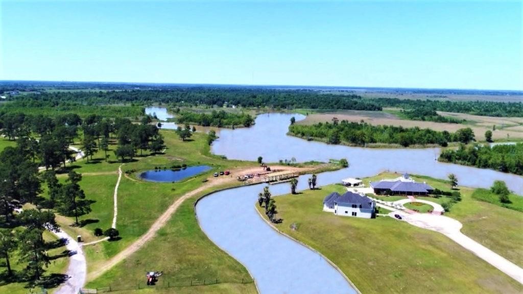 15205 Grace Circle Beaumont, TX 77705 - Photo 5 of 7 an aerial view of a house with a garden
