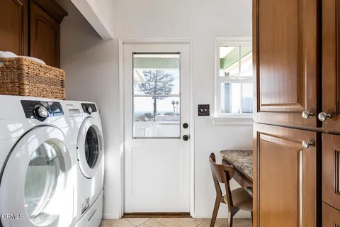 a kitchen with a stove and a microwave