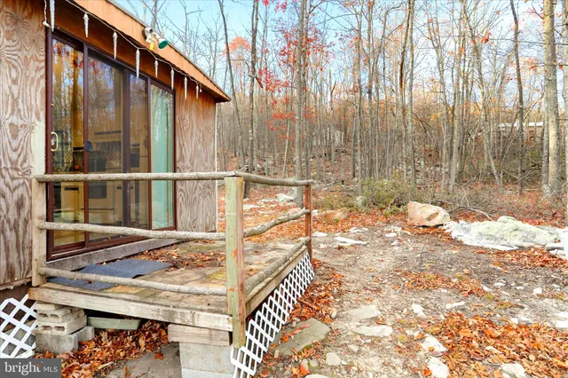 a living room with lots of furniture and appliances