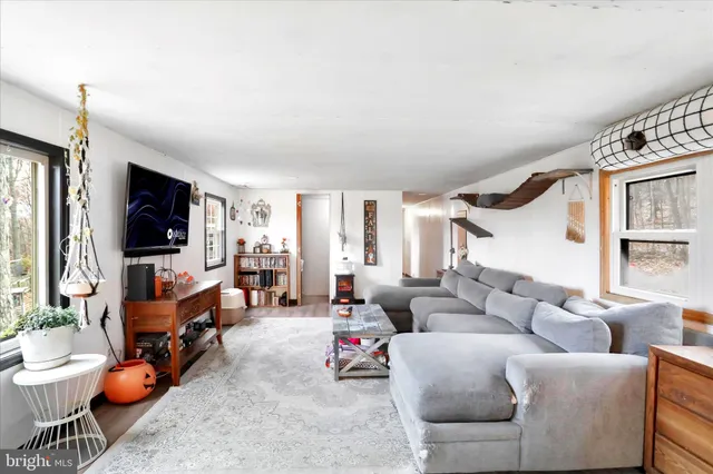 a bathroom with a sink mirror and vanity
