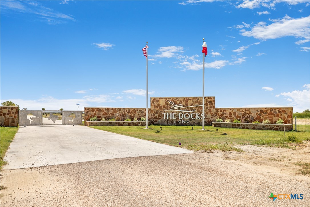 Lot 4 Gunnison Rd Port Port O'Connor, TX 77982 - Photo 13 of 15 a view of a house with a yard and a large tree