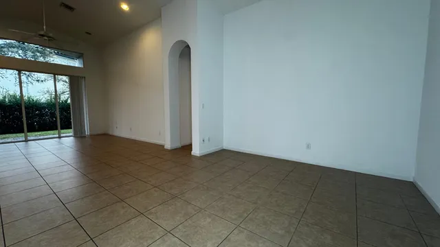 an empty room with sliding door