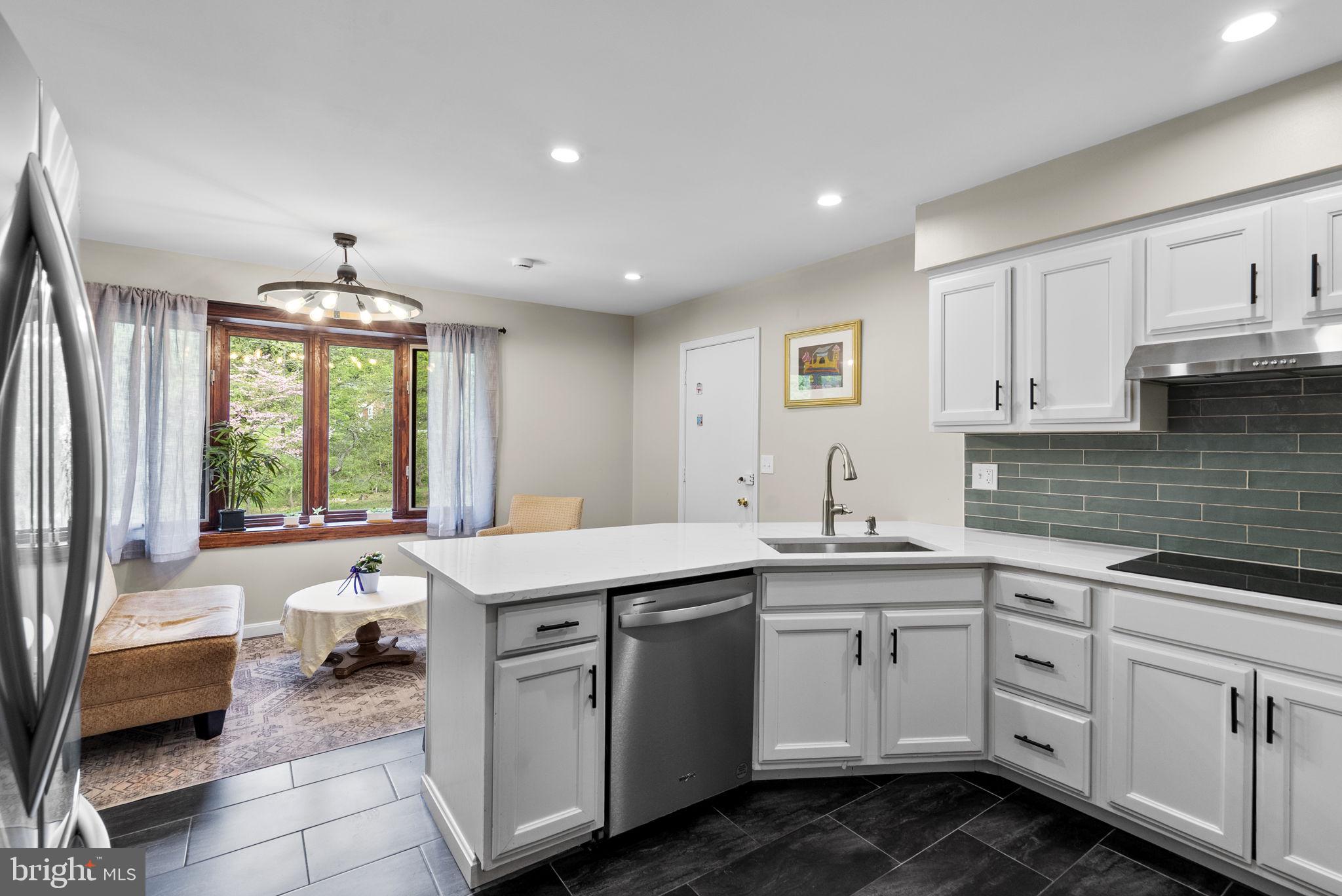 12410 Piedmont Road Clarksburg, MD 20871 - Photo 16 of 64 Modern kitchen with natural light.