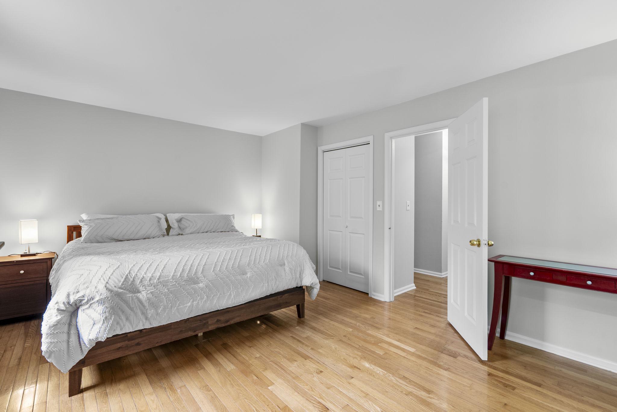 12410 Piedmont Road Clarksburg, MD 20871 - Photo 26 of 64 Primary bedroom with warm wood floors.