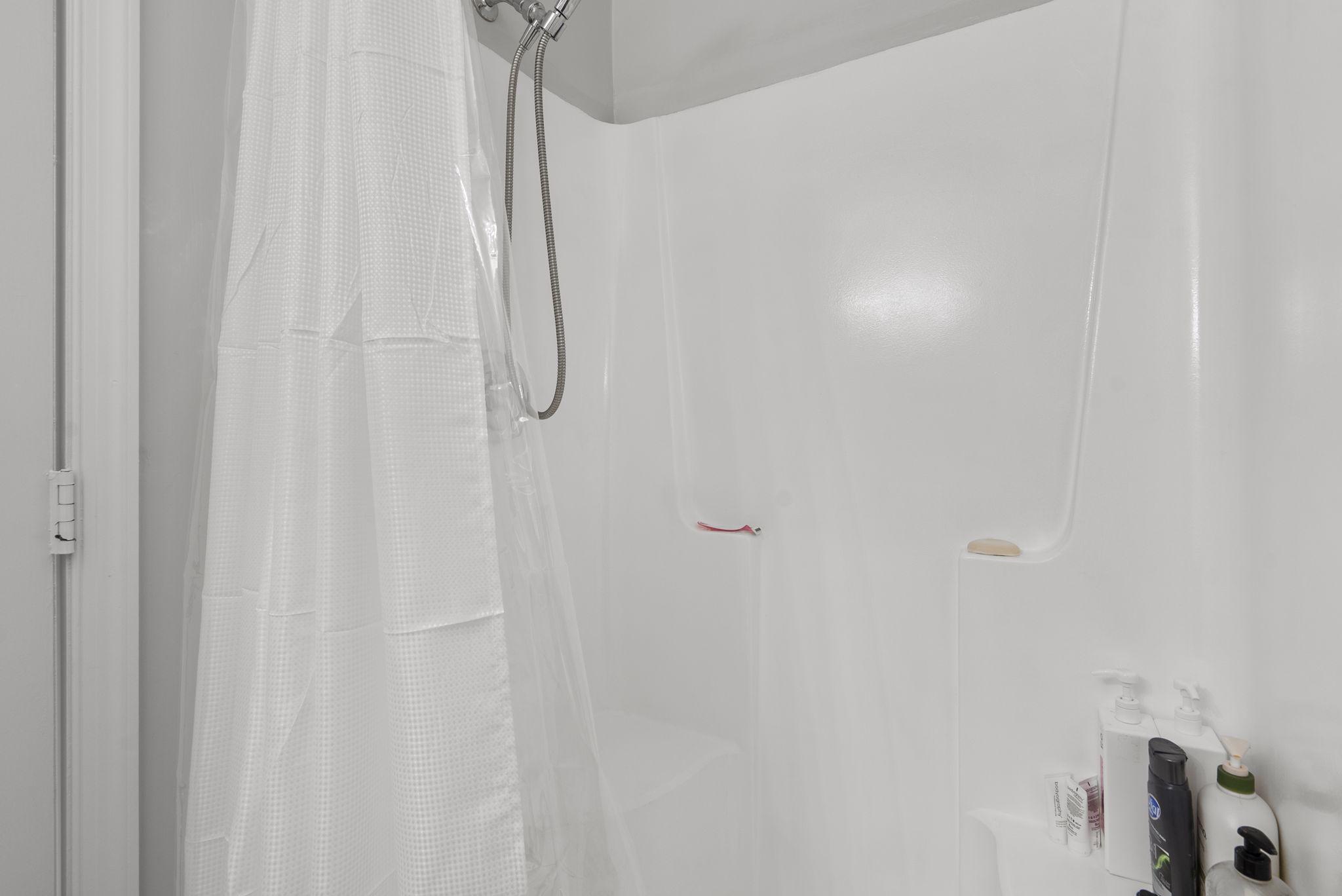 12410 Piedmont Road Clarksburg, MD 20871 - Photo 30 of 64 Primary shower space with sleek design.