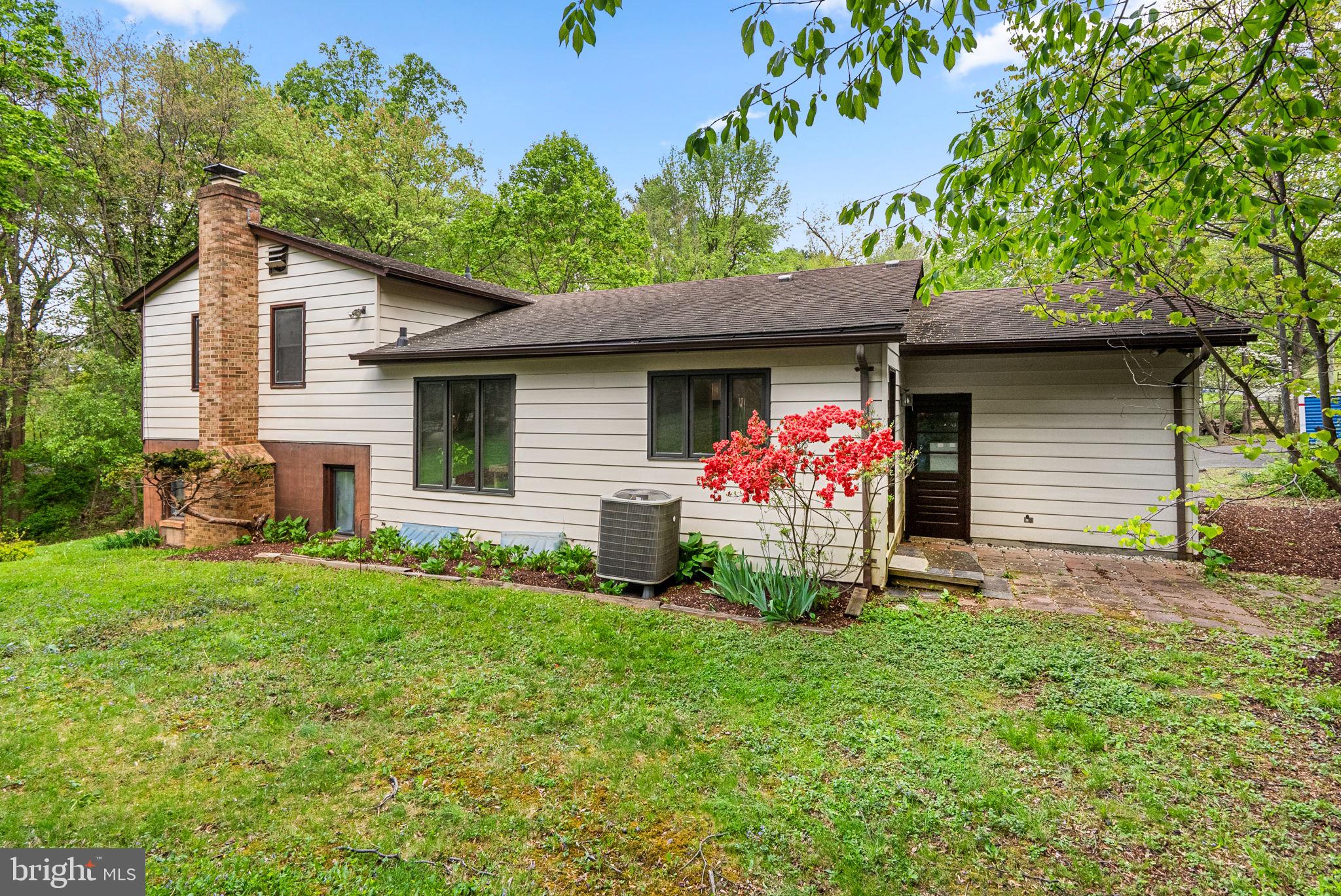 12410 Piedmont Road Clarksburg, MD 20871 - Photo 59 of 64 Charming home nestled in lush greenery.