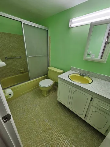 a bathroom with a sink and tub
