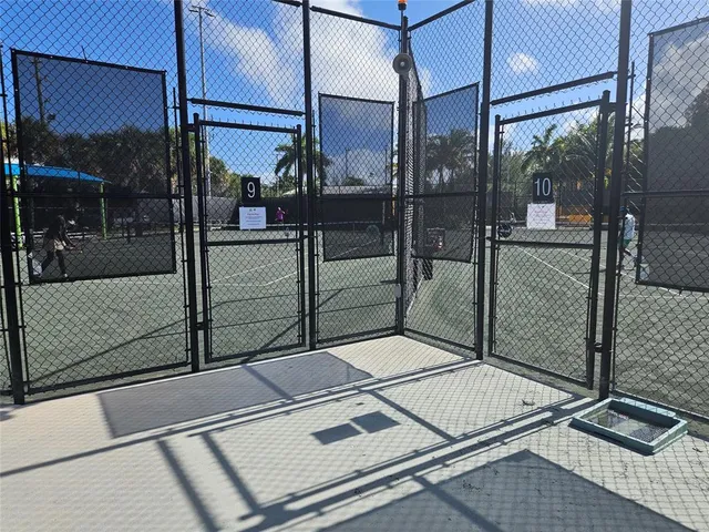 a view of a park with sitting area