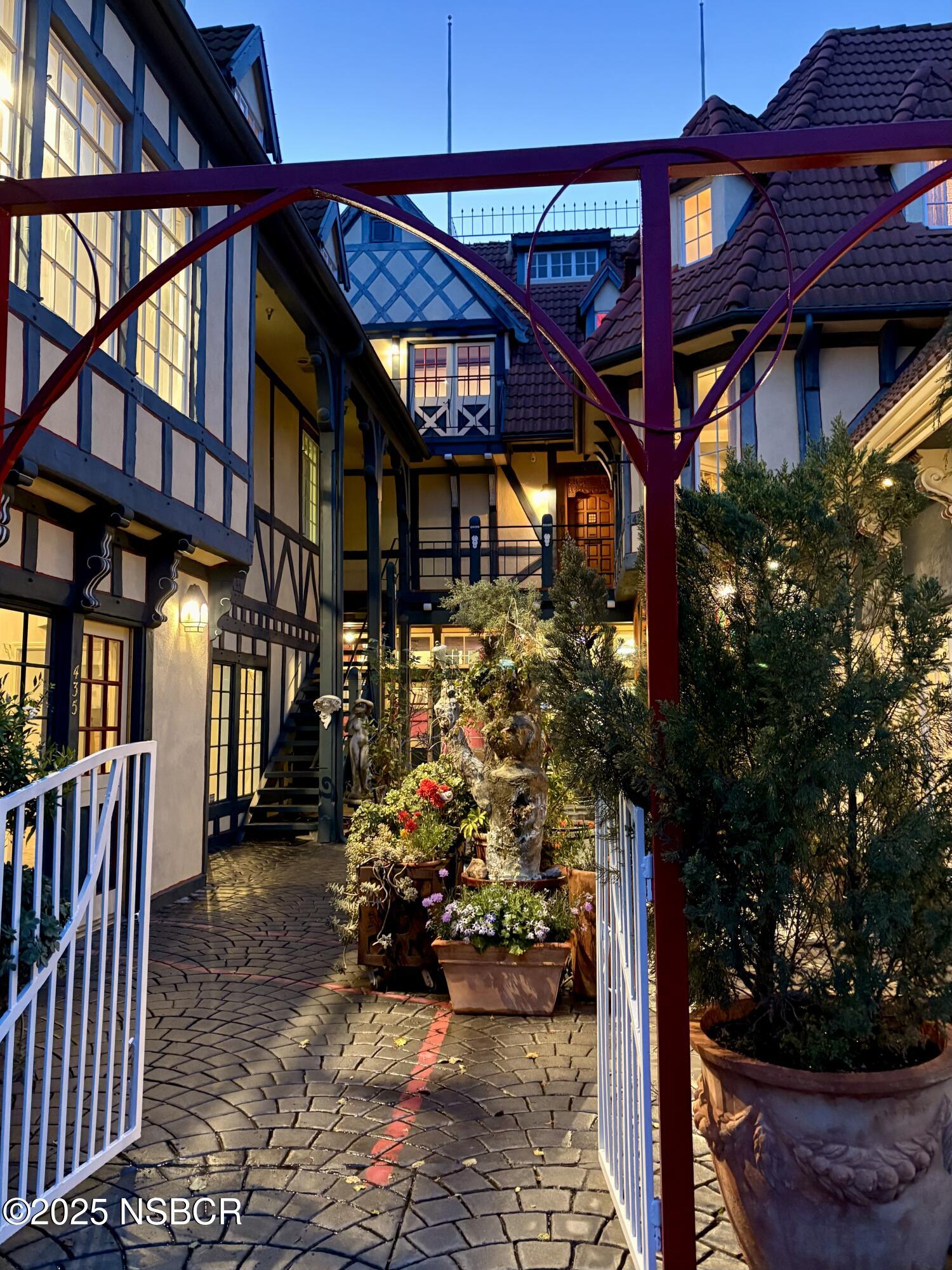 437 2nd Street Solvang, CA 93463 - Photo 5 of 39 a view of a chairs and tables in the patio