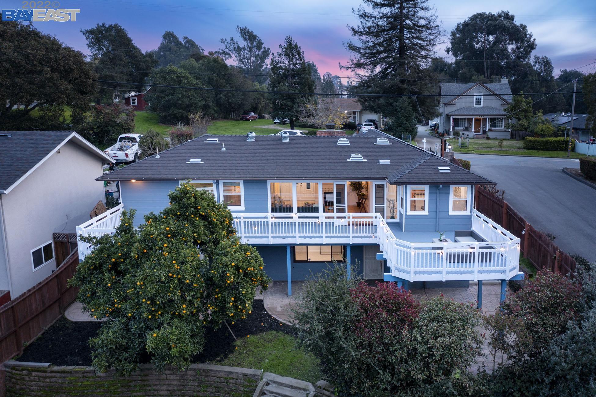 1640 E Street Hayward, CA 94541 - Photo 1 of 1 a aerial view of a house with a yard and a swimming pool