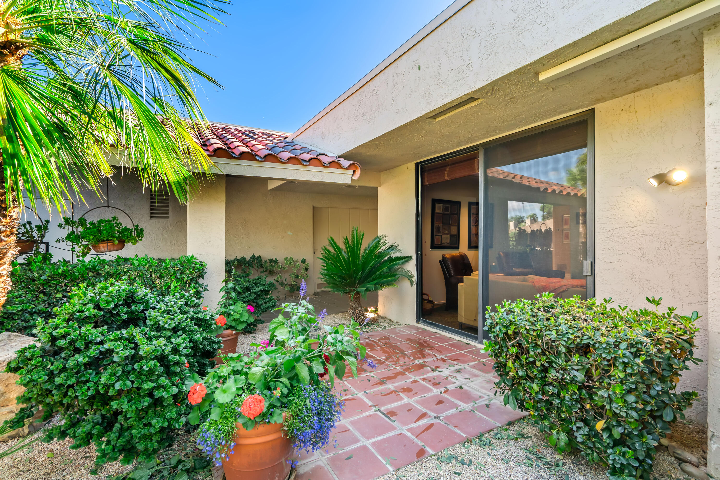 47 Columbia Drive Rancho Mirage, CA 92270 - Photo 33 of 59 a front view of a house
