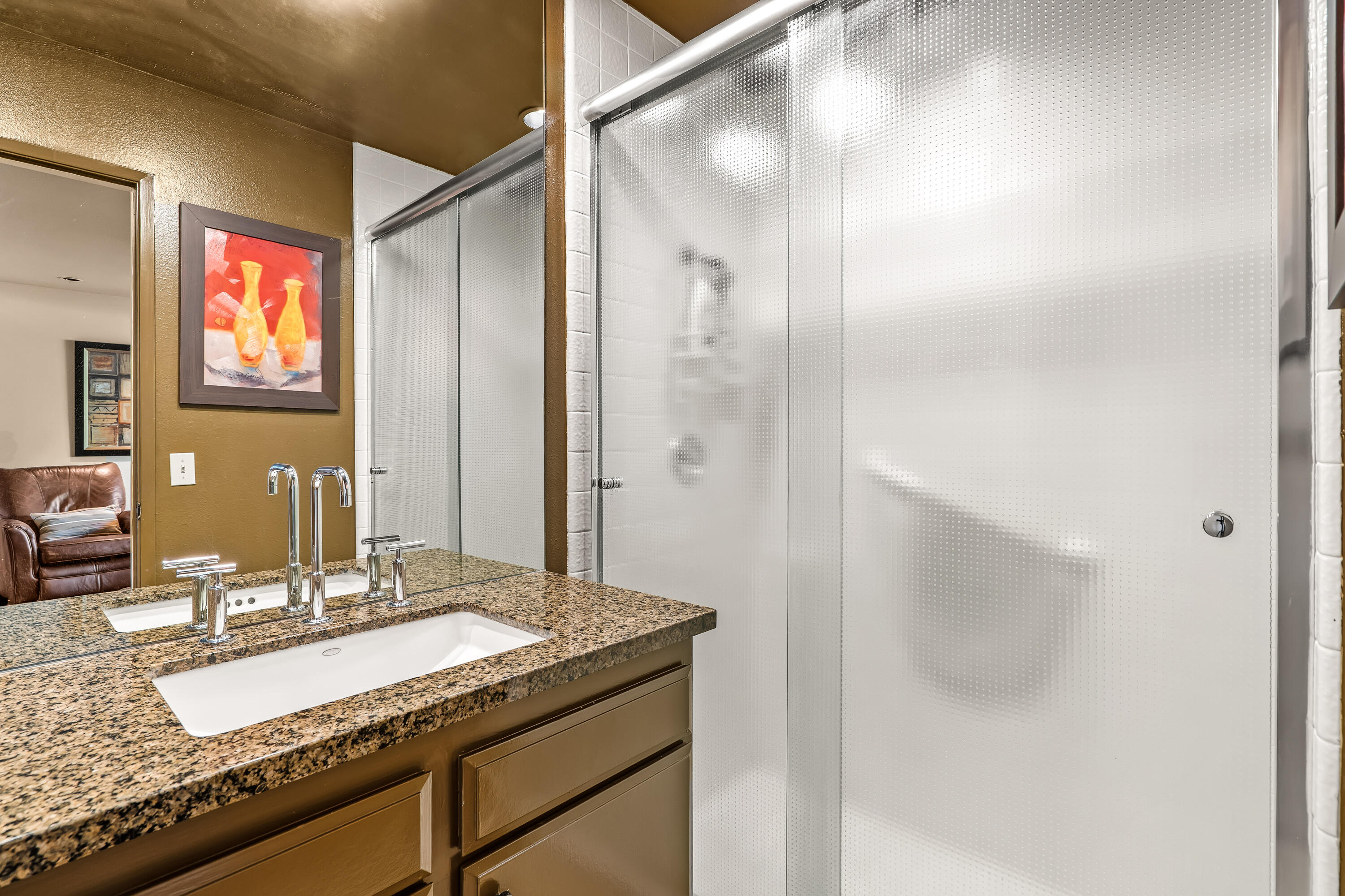 47 Columbia Drive Rancho Mirage, CA 92270 - Photo 37 of 59 a bathroom with a granite countertop sink and a mirror