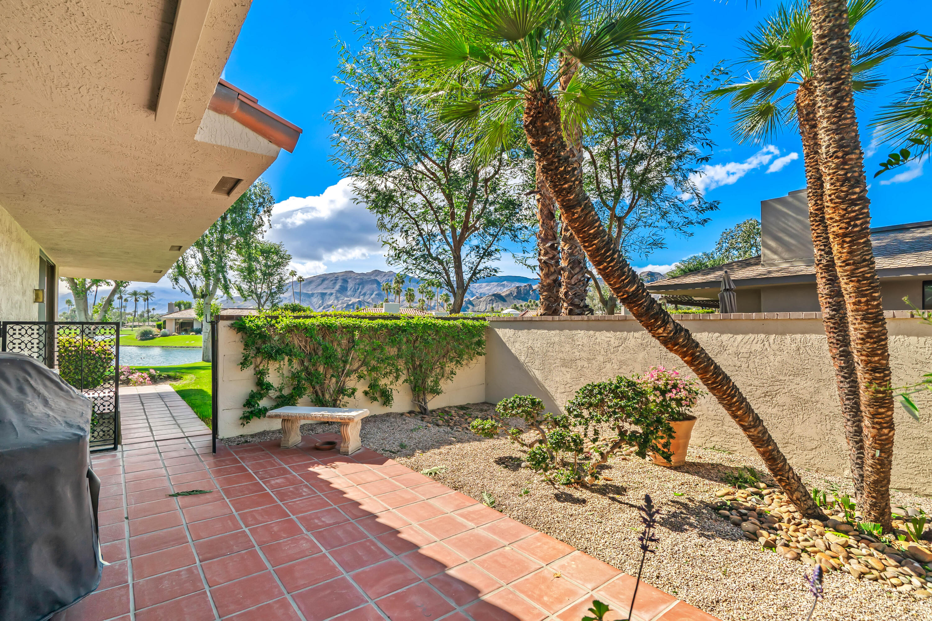 47 Columbia Drive Rancho Mirage, CA 92270 - Photo 50 of 59 a view of swimming pool with a patio