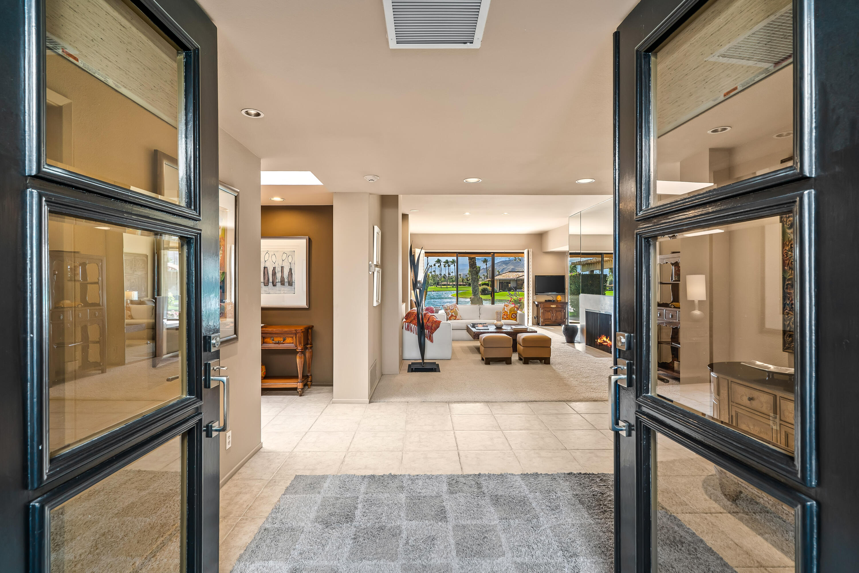 47 Columbia Drive Rancho Mirage, CA 92270 - Photo 6 of 59 a view of a lobby with furniture and large windows