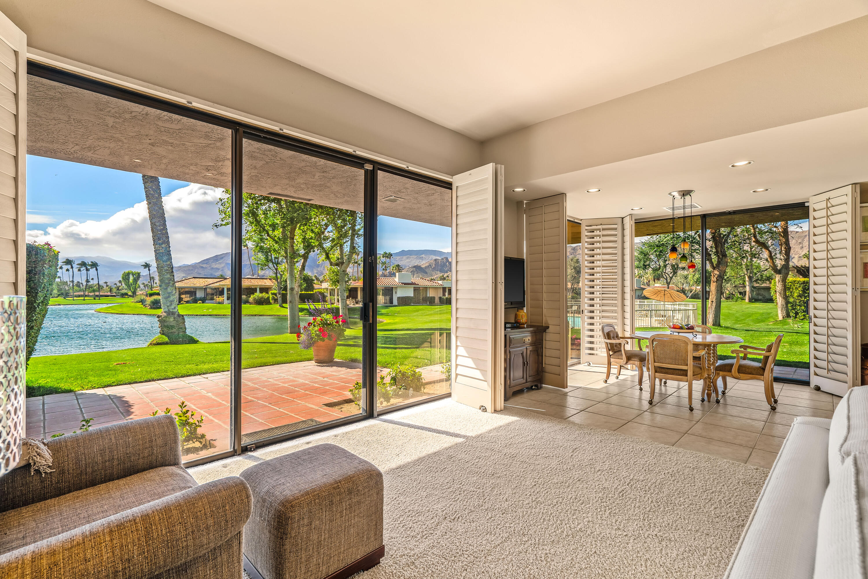 47 Columbia Drive Rancho Mirage, CA 92270 - Photo 8 of 59 a bedroom with furniture and large windows