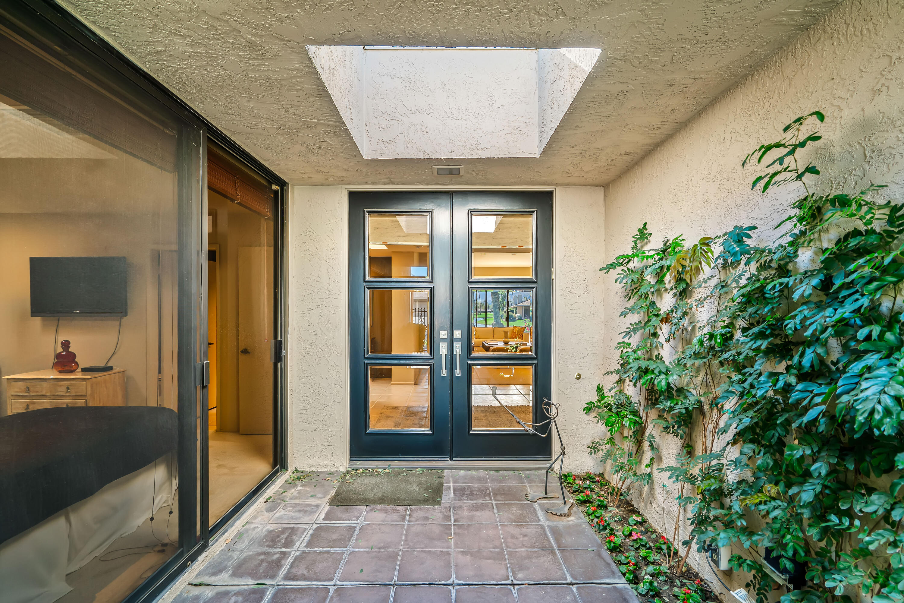47 Columbia Drive Rancho Mirage, CA 92270 - Photo 10 of 59 a view of an entryway of the house
