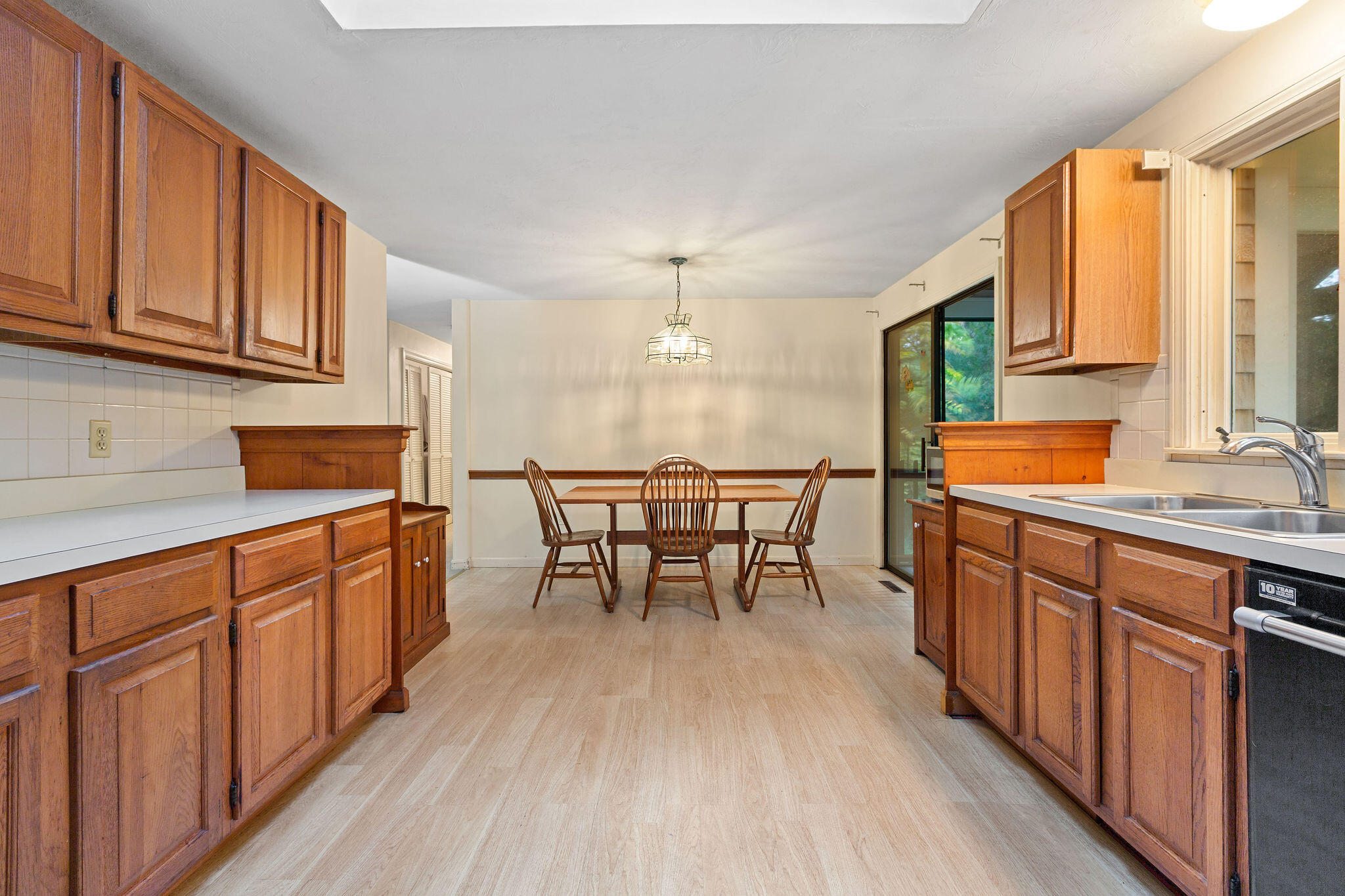 11 Windjammer Road Harwich, MA 02645 - Photo 18 of 29 a kitchen with stainless steel appliances granite countertop sink stove top oven and cabinets