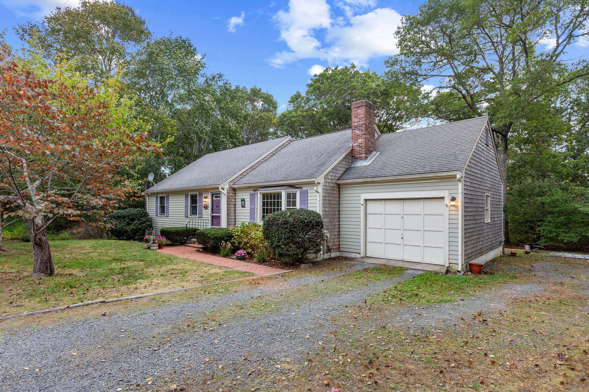 11 Windjammer Road Harwich, MA 02645 - Photo 2 of 29 a front view of a house with a yard