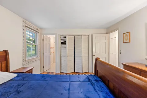 a bathroom with a sink a mirror and a shower