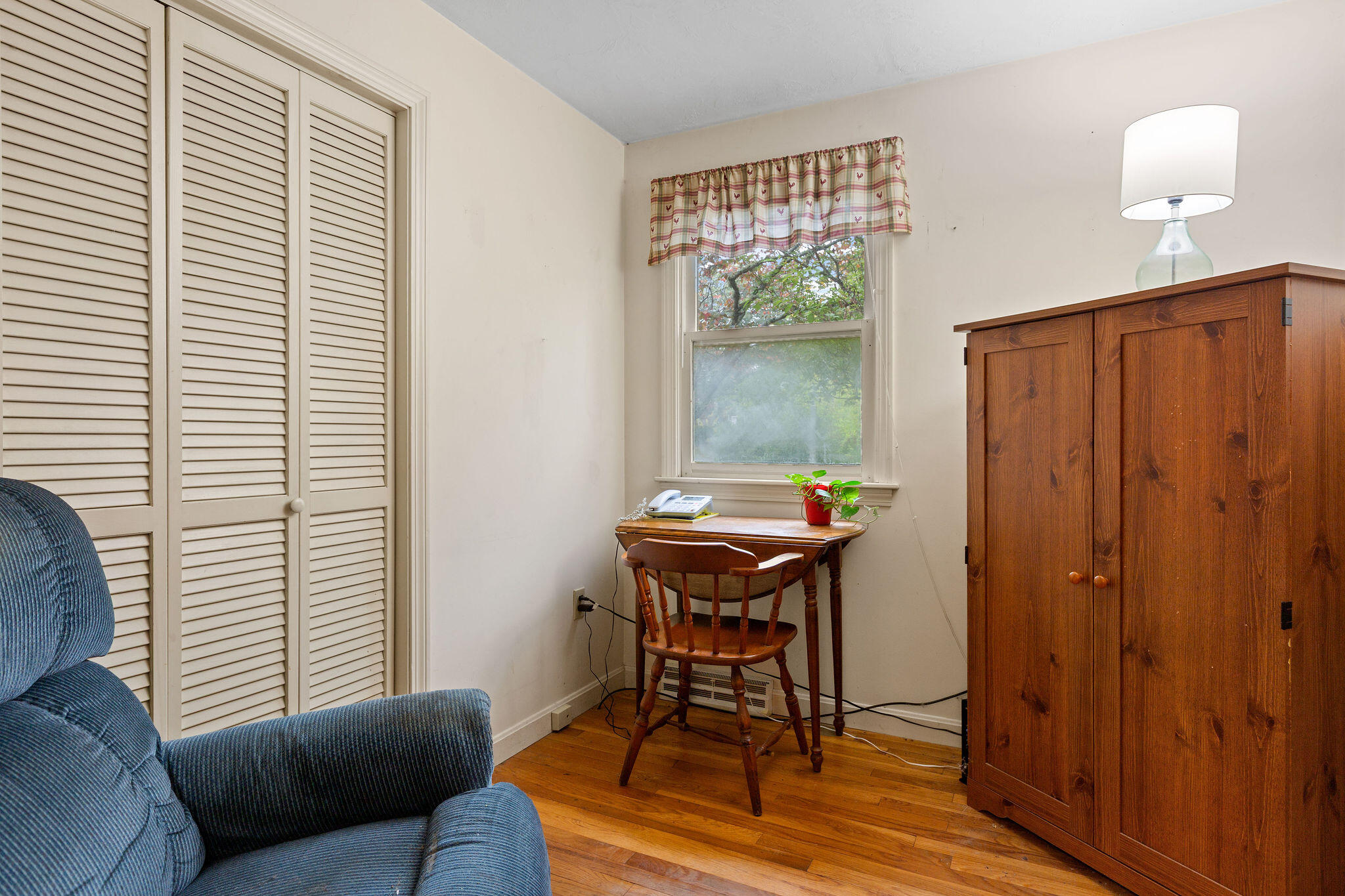 11 Windjammer Road Harwich, MA 02645 - Photo 27 of 29 a living room with furniture and a window